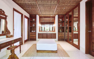 Master bedroom at the Pita Linggar 3 bedroom home on the Como Shambhala estate with wooden features